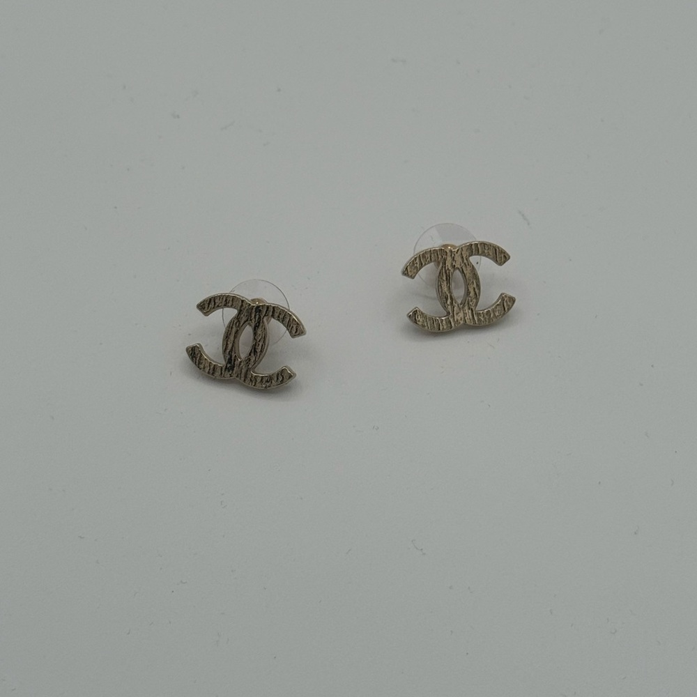 CHANEL Gold Logo Stud Earrings